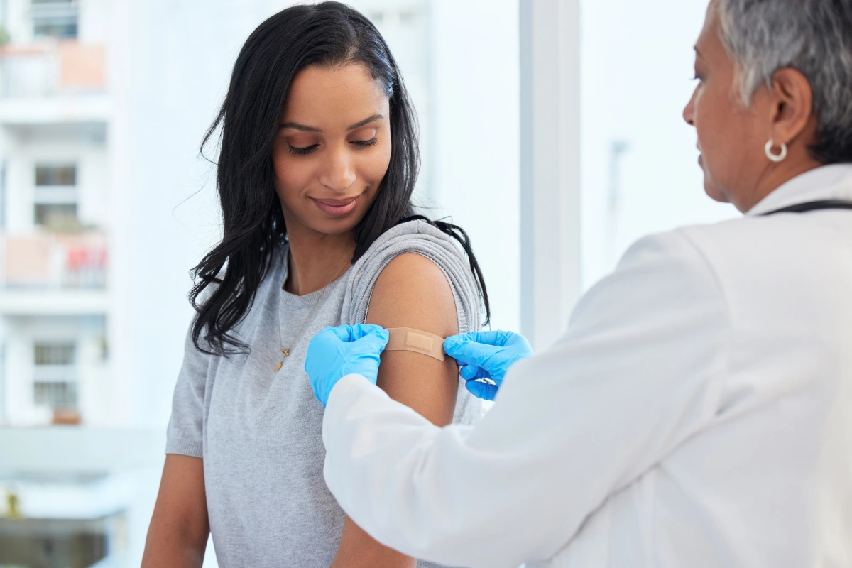 a patient receiving a vaccination